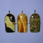 Кулоны с Симбирцитом и<br>Сенгилитом