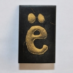 Буква Ё из камня Симбирцит