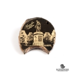 Фрагмент аммонита с гравировкой